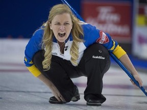 Alberta skip Chelsea Carey calls a shot during the third draw against Newfoundland and Labrador at the Scotties Tournament of Hearts in Grande Prairie, Alta., Sunday, Feb. 21, 2016. THE CANADIAN PRESS/Jonathan Hayward