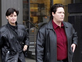 At right, Stéfanie Trudeau, Agent 728, accompanied by an unknown woman, leaves the Montreal courthouse  Thursday February 25, 2016.
