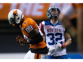 Montreal Alouettes' Mitchell White (32) reacts after B.C. Lions' A.C. Leonard dropped a pass during the second half of a CFL football game in Vancouver, B.C., on Thursday August 20, 2015.