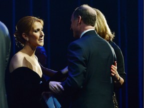 Patrick Angelil and Céline Dion receive condolences from friends during Rene Angelil's memorial ceremony on February 3, 2016 in Las Vegas, Nevada.