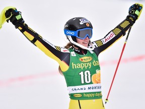 Marie-Michèle Gagnon of Lac-Etchemin celebrates her third-place finish during the Audi FIS Alpine Ski World Cup Women's Slalom on Feb. 15, 2016, in Crans Montana, Switzerland.
