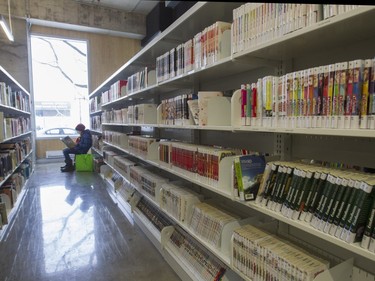 Blanche T'Scharner finds a spot to read at the N.D.G. Cultural Centre and Benny Library in Montreal Saturday, Feb. 6, 2016.