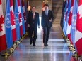 Canadian Prime Minister Justin Trudeau (R) and UN Secretary-General Ban Ki Moon leave after participating in a press conference on Parliament Hill in Ottawa, Ontario on February 11, 2016.