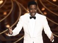 Host Chris Rock speaks at the Oscars on Sunday, Feb. 28, 2016, at the Dolby Theatre in Los Angeles.