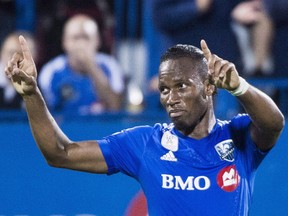 Montreal Impact's Didier Drogba celebrates after scoring against Chicago Fire during first half MLS soccer action in Montreal on Sepetember 23, 2015. The Montreal Impact arrived in St. Petersburg, Fla., on Monday for a pre-season tournament that will see them play four times in 11 days.
