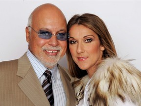 Céline Dion and her husband, René Angelil, pose for a picture backstage during the 2004 World Music Awards at the Thomas and Mack Center on Sept. 15, 2004. in Las Vegas, Nevada.