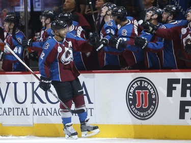 Colorado Avalanche right wing Jarome Iginla, front, is congratulated after scoring the go-ahead goal in the third period of an NHL hockey game against the Montreal Canadiens Wednesday, Feb. 17, 2016, in Denver. Colorado won 3-2.