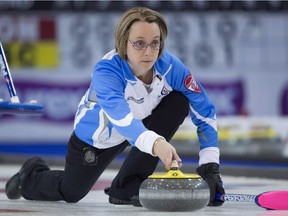 Quebec skip Marie-France Larouche makes a shot during the 8th draw against Manitoba at the Scotties Tournament of Hearts in Grande Prairie, Alta. Tuesday, Feb. 23, 2016.