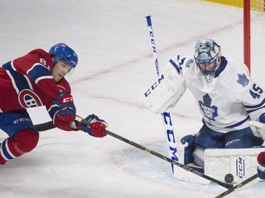 Montreal Canadiens' Lars Eller shoots on Toronto Maple Leafs goaltender Jonathan Bernier during second period NHL hockey action in Montreal, Saturday, February 27, 2016.