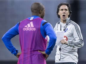 Impact head coach Mauro Biello, right, with midfielder Patrice Bernier,  is the only Canadian coach in Major League Soccer.