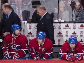 Montreal Canadiens head coach Michel Therrien leaves the bench past players David Desharnais, Max Pacioretty and Brendan Gallagher, left to right, following their 3-1 loss to the Pittsburgh Penguins in NHL hockey action Saturday, January 9, 2016 in Montreal.
