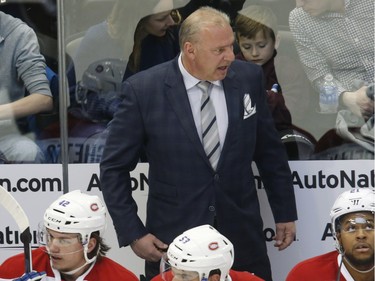 Montreal Canadiens head coach Michel Therrien watches play against the Colorado Avalanche Feb. 17, 2016, in Denver.