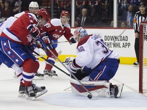 Canadiens goalie Mike Condon makes a save against Capitals centre Marcus Johansson during the second period on Wednesday, Feb. 24, 2016, in Washington.