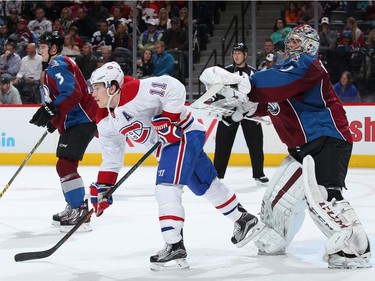 Goalie Semyon Varlamov #1 of the Colorado Avalanche defends the crease against Brendan Gallagher #11 of the Montreal Canadiens at Pepsi Center on February 17, 2016 in Denver, Colorado.