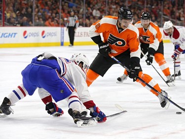 Brayden Schenn #10 of the Philadelphia Flyers shoots in front of Mark Barberio #45 of the Montreal Canadiens during the second period at Wells Fargo Center on February 2, 2016 in Philadelphia, Pennsylvania.