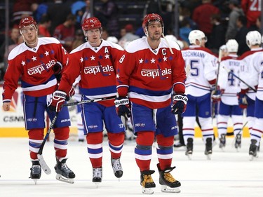 Alex Ovechkin #8 of the Washington Capitals and teammates skate off the ice after losing to the Montreal Canadiens, 4-3, at Verizon Center on February 24, 2016 in Washington, DC.