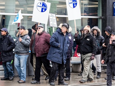 Montreal taxi drivers participate in a protest rally against Uber at Trudeau airport on Wednesday, Feb. 10, 2016.