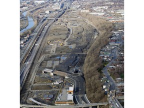 A view of the Turcot interchange construction project (left) with the Falaise St-Jacques / St Jacques Escarpment on the right.