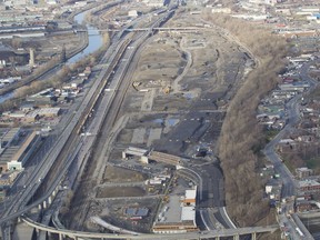 This April 2015 photo shows the Turcot Interchange construction site and the falaise St-Jacques at right.