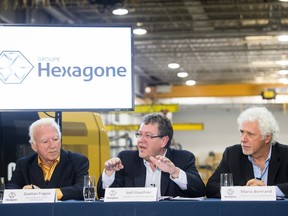 Left to right: Gaetan Frigon, vice-president of the board of directors, Joel Gauthier, president and CEO, and Mario Bertrand, president of the board of directors, of Groupe Hexagone speak to the media during a press conference to unveil the details of the group's purchase of the portion of Tony Accurso's construction company in Anjou in Montreal on Tuesday, April 30, 2013. On Feb. 2, 2016, Groupe Hexagone SEC  filed a notice of intention to make a proposal to creditors.