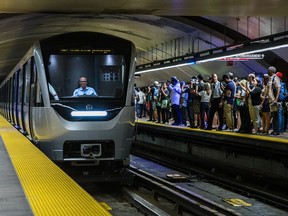 The new Azur métro cars arrive at the Henri-Bourassa métro station during a press event to show the train's interior design in Montreal on Tuesday, Aug. 25, 2015.