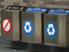 Waste and recycling bins installed at the Place des Arts metro station in Montreal.