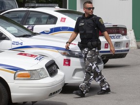 Police in camouflage protest pants.