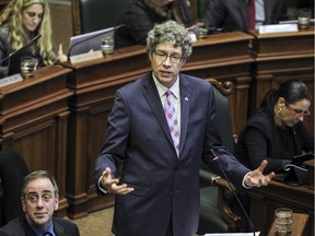 Russell Copeman, borough mayor for Côte-des-Neiges-Notre-Dame-de-Grâce, answers a question during a city council meeting at city hall in Montreal Monday Dec. 14, 2015.  Copeman is also a member of the city's executive committee and the councillor responsible for housing and urban planning for Mayor Denis Coderre's administration.