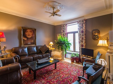 A view of the double room that is the living space in Johanne Giguere's home in the Plateau-Mont-Royal. (Dario Ayala / Montreal Gazette)