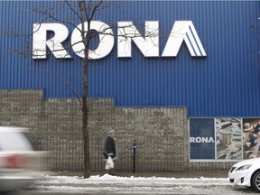 A pedestrian walks by a Rona store on Notre-Dame street in St-Henri, Montreal on February 3, 2016. The question of whether former Liberal cabinet minister Jacques Daoust - or any other member of the Couillard government -signed off on the deal will be front and centre later this week before a National Assembly committee.