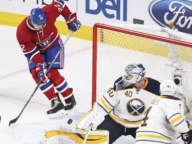 Montreal Canadiens Dale Weise scores against Buffalo Sabres goaie Robin Lehner and defenceman Josh Gorges during second period of National Hockey League game in Montreal Wednesday February 3, 2016.