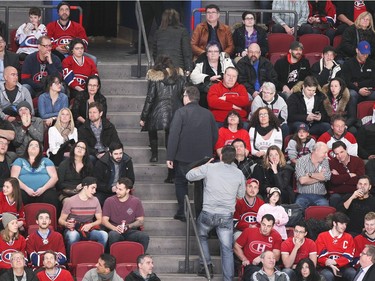 Montreal Canadiens fans head to the exits after Buffalo Sabres Johan Larsson scored the winning goal during third period of National Hockey League game in Montreal Wednesday February03, 2016.