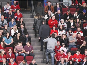 Montreal Canadiens fans head to the exits after Buffalo Sabres Johan Larsson scored the winning goal during third period of National Hockey League game in Montreal on Feb. 3, 2016.