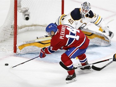 Montreal Canadiens Tomas Plekanec shoots the puck wide against Buffalo Sabres Robin Lehner during third period of National Hockey League game in Montreal Wednesday February 3, 2016.