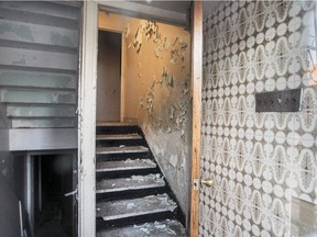 Peeling paint and plaster in the vestibule of an apartment building at 8151 Stuart Ave. in Montreal Friday Feb. 5, 2016.  Owner Claudio Di Giambattista, who passed away in December, was ordered to pay a former tenant nearly $13,000 in damages in a  December judgment by the Régie du Logement,
