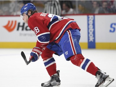 Montreal Canadiens defenceman Nathan Beaulieu grimaces after taking a shot off his foot during second period of National Hockey League game against the Tampa Bay Lightning in Montreal Tuesday February 9, 2016.