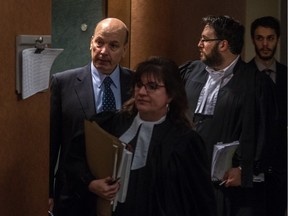 Frank Zampino, left, leaves the courtroom at the Montreal courthouse with his lawyer Isabel Schurman at the corruption trial into the Contrecoeur real-estate development, on Wednesday, Feb. 10, 2016.