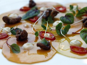 The squash starter called Carpaccio di Zucca is made with thin layers of squash, chill, fresh cream and caramelized nuts at Fiorellino in Montreal.
