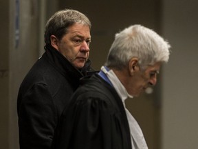 Daniel Gauthier, left, with his lawyer Jean-Claude Hébert, leaves the courtroom after pleading guilty at the Contrecoeur real-estate development corruption trial at the Palais de Justice in Montreal, on Friday, Feb. 12, 2016.