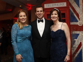 Guests of honour Peter and Autumn Philips, left, with Teresa Dellar, executive director of the West Island Palliative Care Residence at the British-themed gala.