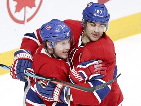Brendan Gallagher celebrates his goal with team-mate Max Pacioretty during the first period against the Nashville Predators on Monday.