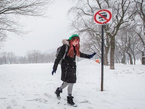 Aurelle Albano catches her balance as she walks over a patch of ice at Jeanne-Mance Park in February 2016.