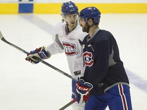 Canadiens forward Dale Weise, left, with Greg Pateryn at Habs practice on Friday, can become unrestricted free agent on July 1 and he's due a raise from the $1 million he earned this season.