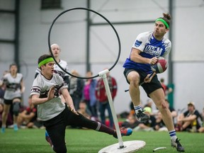 Université de Montréal Quidditch player, right, attempts to score on  University of Ottawa Gee-Gees player during the final of the Qudditch eastern regional championship on Sunday.