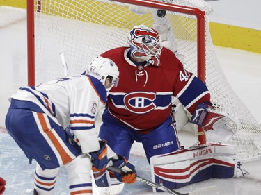 Benoît Pouliot of the Edmonton Oilers scores a short-handed goal against Ben Scrivens of the Montreal Canadiens in the third period of an NHL game at the Bell Centre in Montreal on Saturday, Feb. 6, 2016.