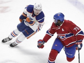 P.K. Subban of the Montreal Canadiens is pursued by Connor McDavid of the Edmonton Oilers in the third period of an NHL game at the Bell Centre in Montreal on Saturday, Feb. 6, 2016.