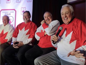 Former 1972 Team Canada member, Phil Esposito (right) talks at a news conference in Montreal on Feb. 9, 2016 with teammates (from the left) Yvan Cournoyer, Peter Mahovlich and Guy Lapointe announcing the '72 Summit Series Tour. Team members from the hockey series in 1972, which pitted top Canadian players against top Soviet Union players, will be touring Canadian cities to talk about their experiences 44 years ago.