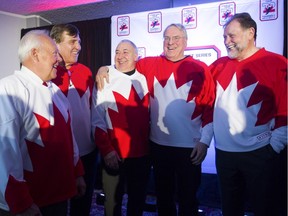 Former 1972 team Canada members (and all members of the Montreal Canadiens) gather at the end of a press conference in Montreal Tuesday, February 9, 2016 to announce the '72 Summit Series Tour. From the left are: Yvan Cournoyer, Serge Savard, Guy Lapointe, Ken Dryden and Pete Mahovlich.