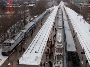 Passengers board the AMT trains at the Lucien-L'Allier station in this cityscape view in Montreal on Tuesday, January 29, 2013.