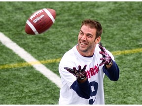 Montreal Alouettes' Eric Deslauriers prepares to catch a pass on the sidelines during a  practice at Hébert Stadium in St-Léonard on July 24, 2013.